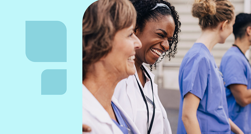 Several health care providers laugh together